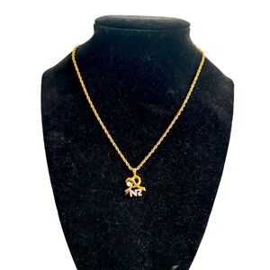 Nina Ricci vintage necklace. In excellent condition. Stud on knot 7.5”